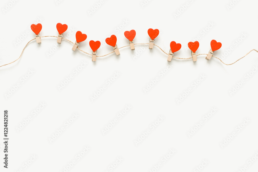 Fotografie Red hearts on clothespins