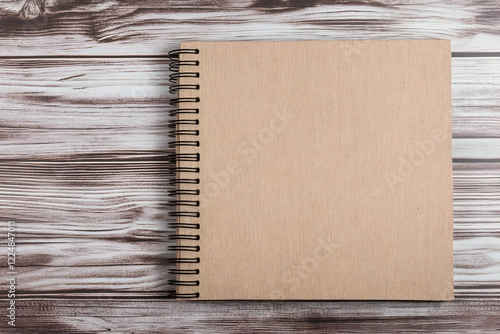 Beige Spiral Notebook Rests...