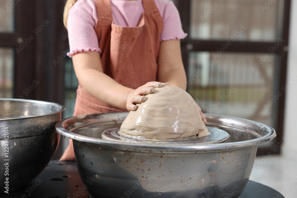 Fototapeta premium Hobby and craft. Girl making pottery indoors, closeup