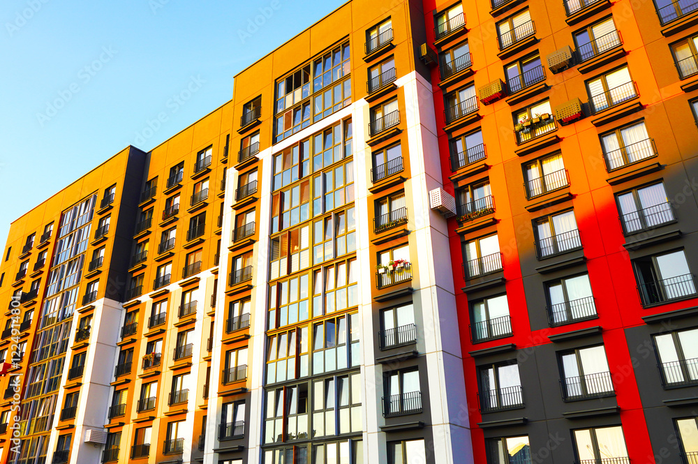 Fototapeta premium Residential architecture exterior. Modern facade building background. Residential condominium building. Modern complex of Apartment residential condo. New House, Eco-friendly residential building.