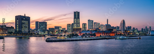 Yokohama skyline panorama at sunset with view of Yokohama Landmark Tower, Minato Mirai, Yokohama, Japan