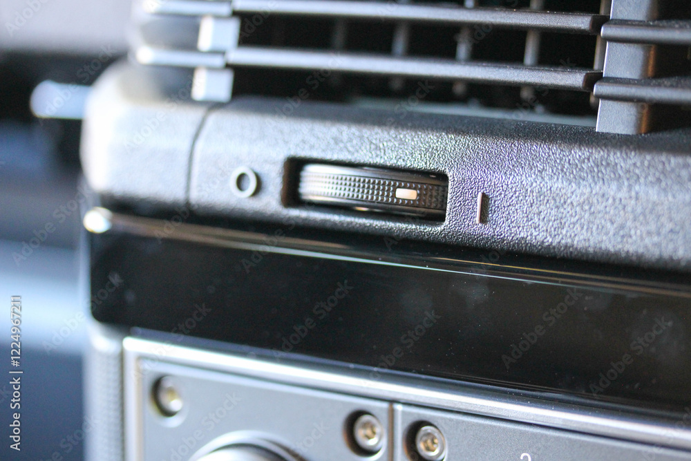 Close up of a rustic vehicle ventilation control