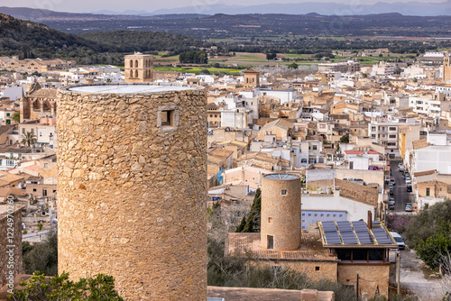 Restored old windmill towers Moli d'en Veny and Moli d'en Bota in front of the townscape of Felanitx, Mallorca, Balearic Islands, Spain, Europe photo