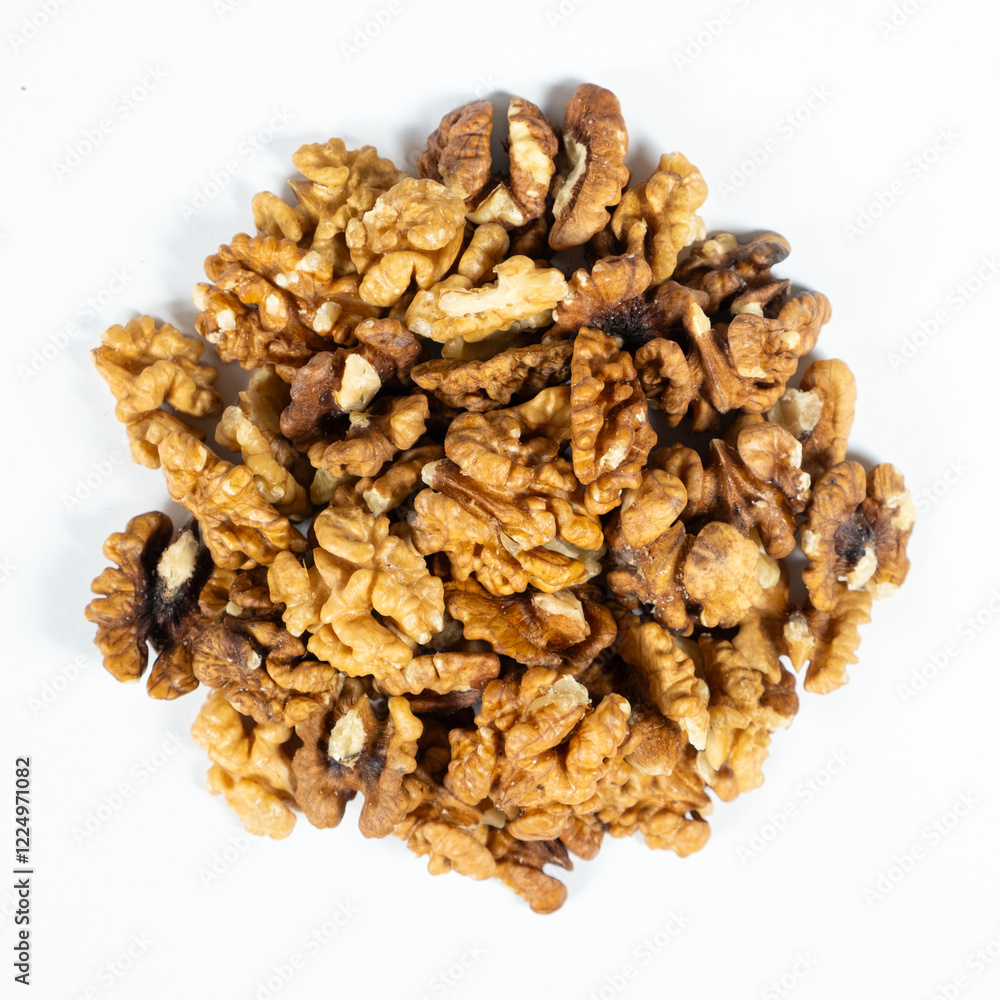 Shelled walnuts on a white background close-up Shelled walnuts on a white background close-up