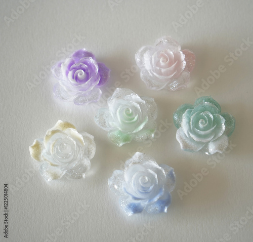 plastic rose decorate color background photo