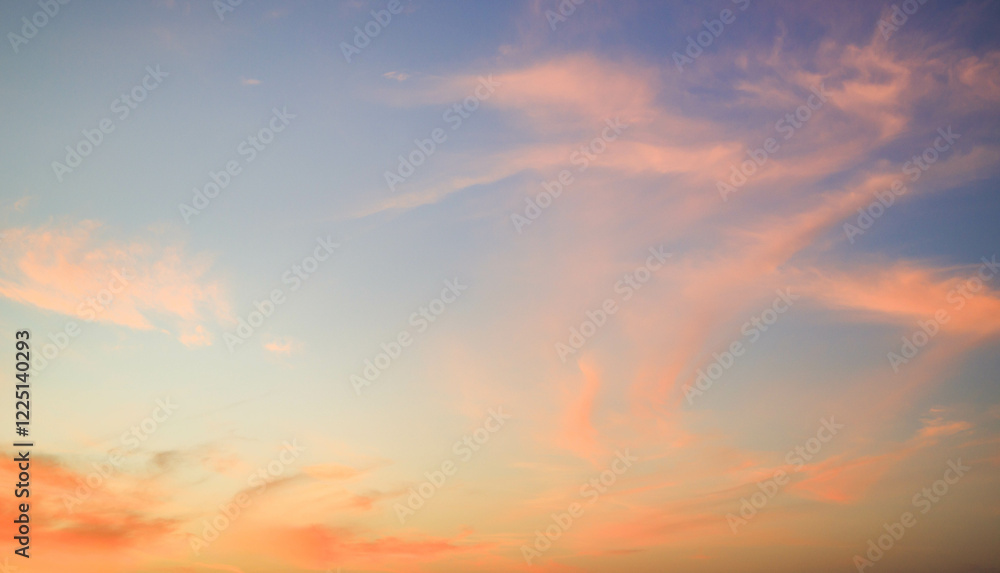 Obraz premium Sky Summer Sunset Background with Nature Light and clouds on Colorful Orange Pink and Blue Fantasy Sunrise Sky, Beautiful Horizon Dusk Sky in the