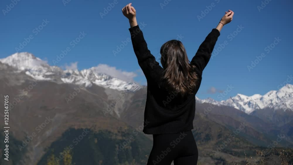 Beautiful girl enjoys stunning mountain views Beautiful girl enjoys stunning mountain views