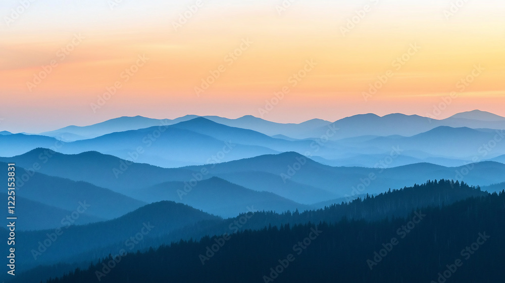 Obraz premium Serene mountain landscape at sunset with layered hills and soft colors creating a tranquil atmosphere