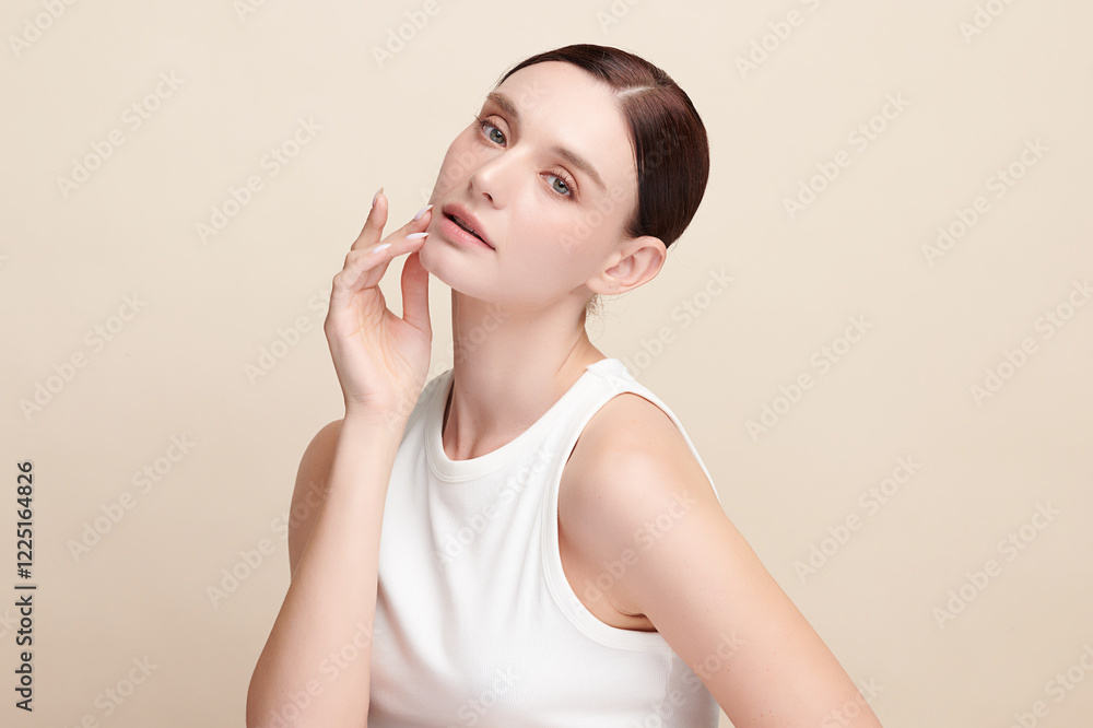 Beautiful young woman with clean fresh skin on beige background, Face care, Facial treatment, Cosmetology, beauty and spa, women portrait. Beautiful young woman with clean fresh skin on beige background, Face care, Facial treatment, Cosmetology, beauty and spa, women portrait.