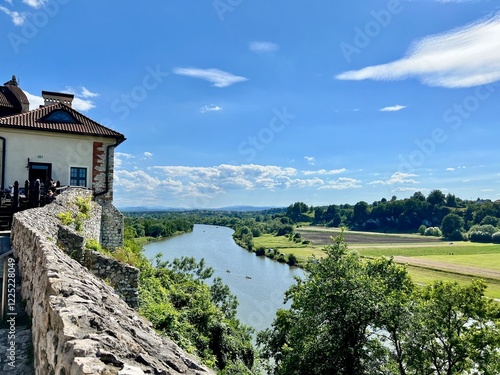 View of the Vistula River and fields from the Benedictine Abbey wall in Tyniec, Krakow, Poland. Perfect for beautiful views, travel, and nature exploration in Bielansko-Tyniec Landscape Park