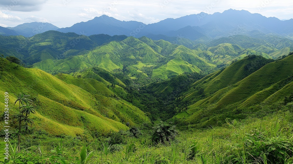 Obraz premium Lush Green Mountain Landscape with Rolling Hills and Dramatic Sky in the Background