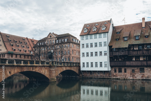 The old town of Nurnberg reflecting in Pegnitz river photo