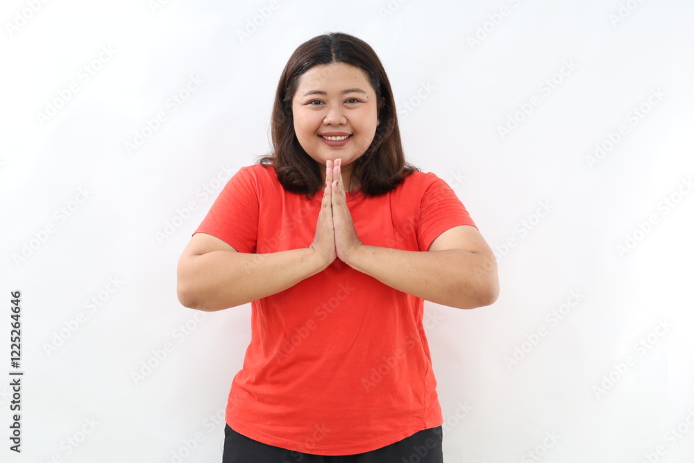 Image of happy asian girl smiling, showing thank you, namaste gesture, grateful for something, standing over white background Image of happy asian girl smiling, showing thank you, namaste gesture, grateful for something, standing over white background