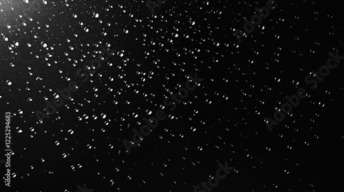Water droplets on black surface