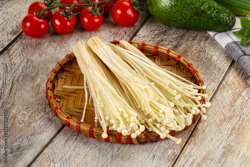 Raw enoki mushroom for cooking photo