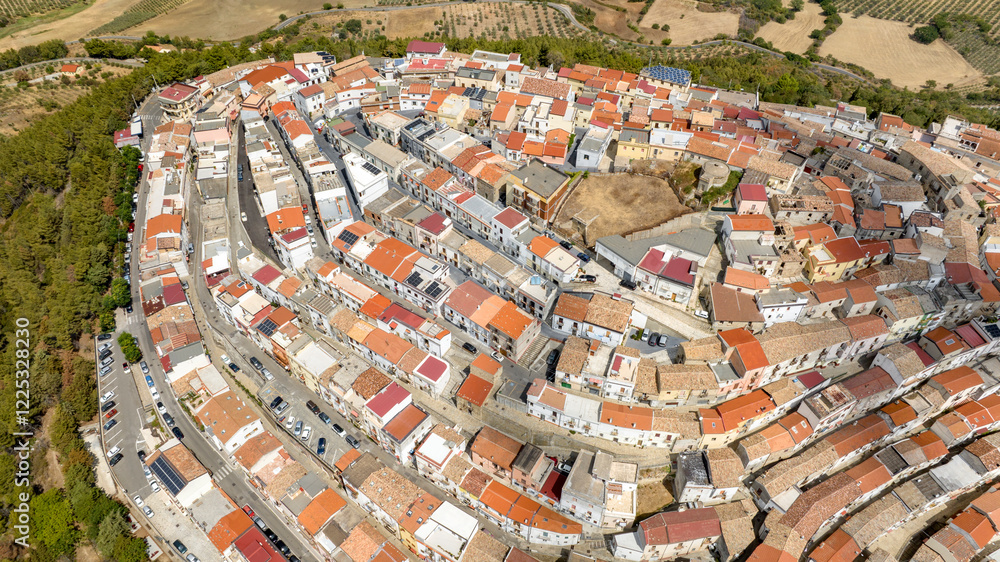 Fototapeta premium Aerial view of the town of Rotondella located on a hill in Basilicata, Italy.