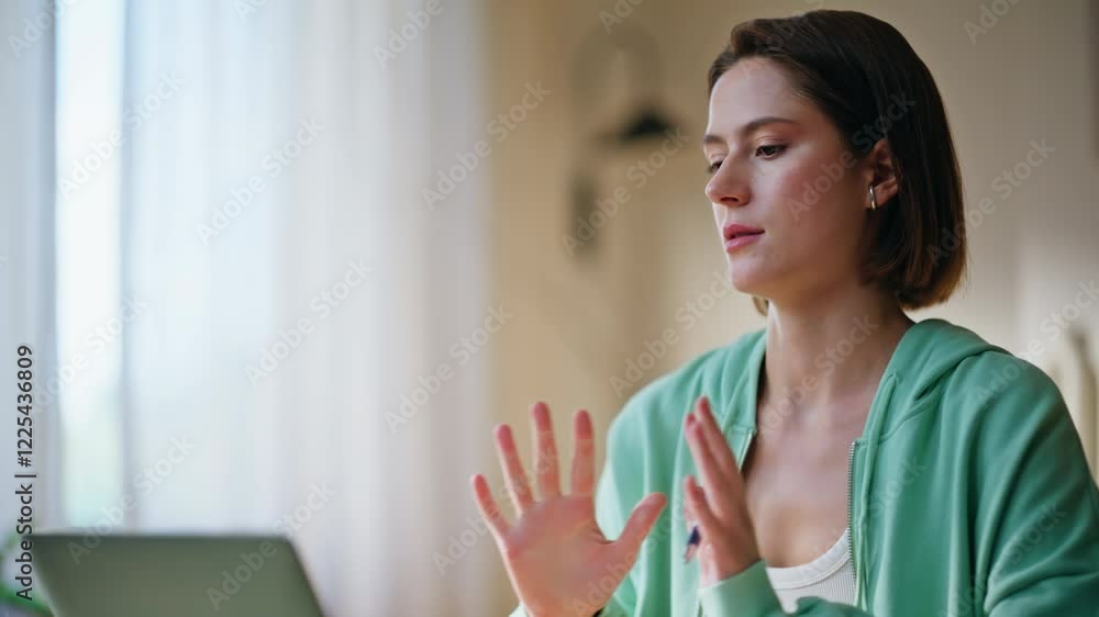 Online consultant video calling laptop in apartment closeup. Professional woman 