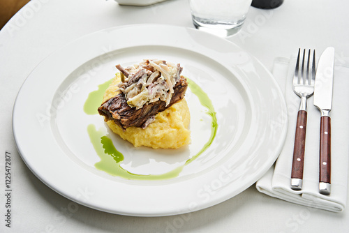 Beef Osso Buco with Mashed Potatoes. Perfectly plated for a fine dining experience photo