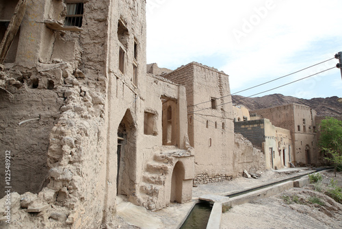 View of the ruins of Birkat Al Mouz, a historical village in Oman photo