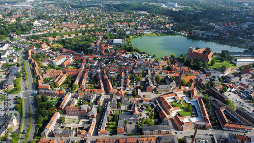 Aerial panorama view around the old town of the city Kolding on a sunny morning summer day in the Denmark photo