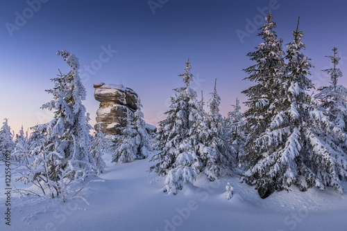 Winter landscape of Šumava. Beautiful landscape picture. Nature of Šumava. Czech Republic. Winter motif. Snowy region. Sunrise over the mountains. 