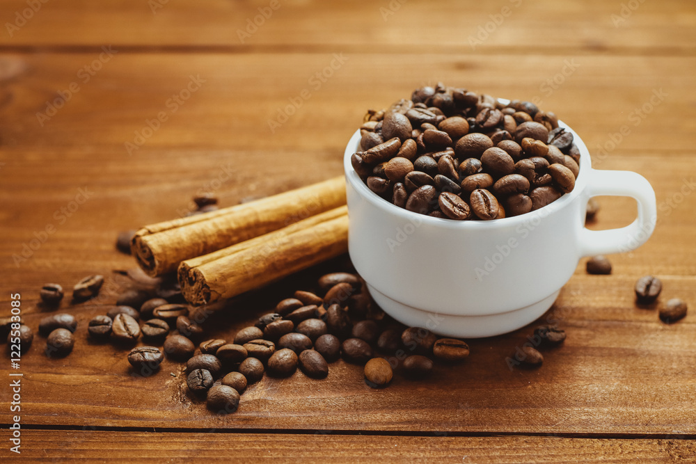 Fototapeta premium Coffee beans and tea leaves on table. Spices. Concept of taste and choice 