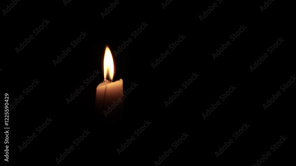 Lone Candle Flame Illuminating the Darkness Lone Candle Flame Illuminating the Darkness