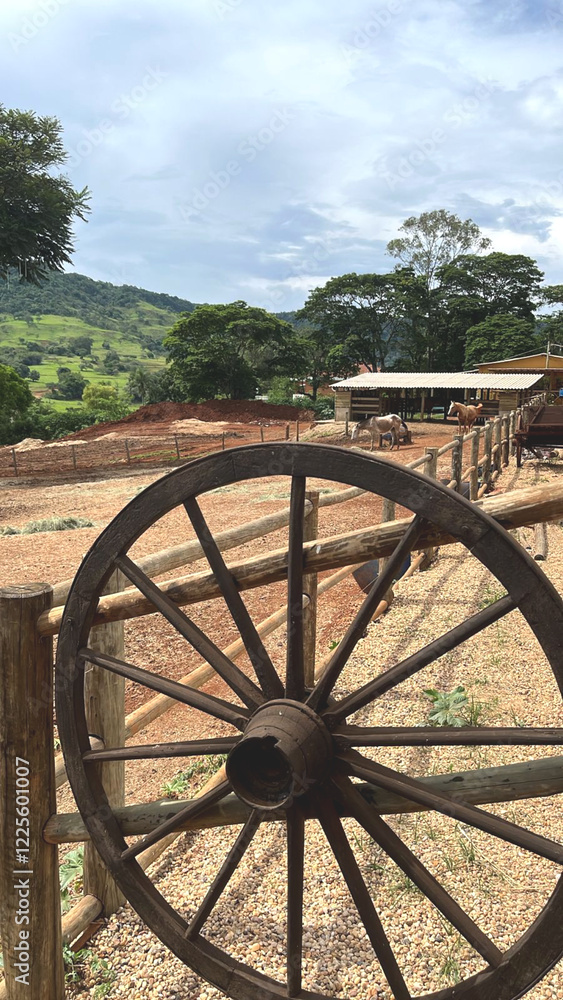 Fototapeta premium Old wooden wheel on a farm
