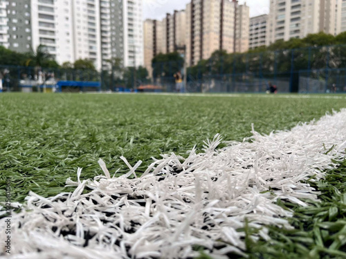 White line marking on football field photo