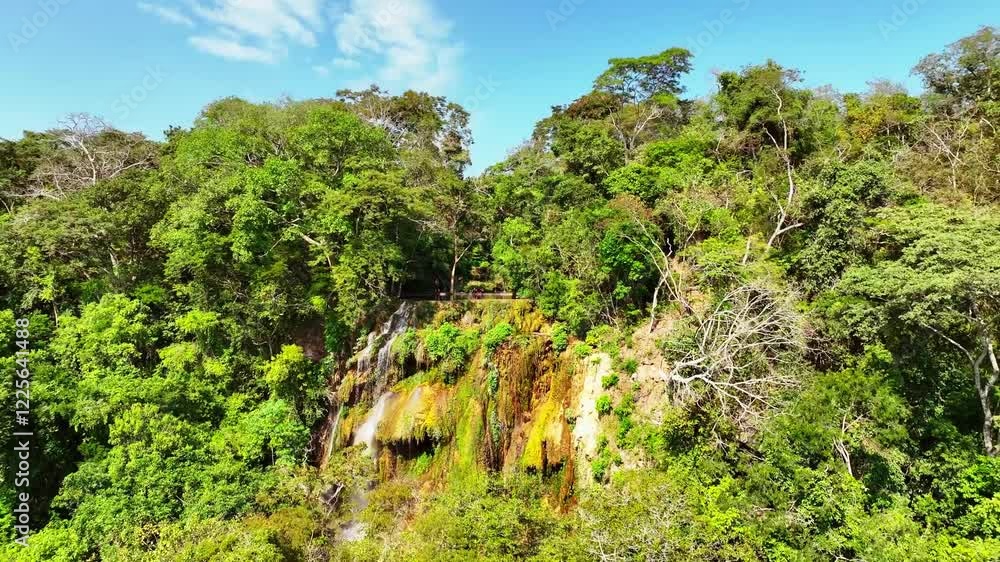 Aerial view of boca da onca waterfall surrounded by lush tropical forest and greenery, Bodoquena, Brazil. Aerial view of boca da onca waterfall surrounded by lush tropical forest and greenery, Bodoquena, Brazil.