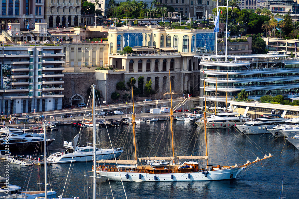 Monaco Monte Carlo buildings and port in summer, sea and mountains