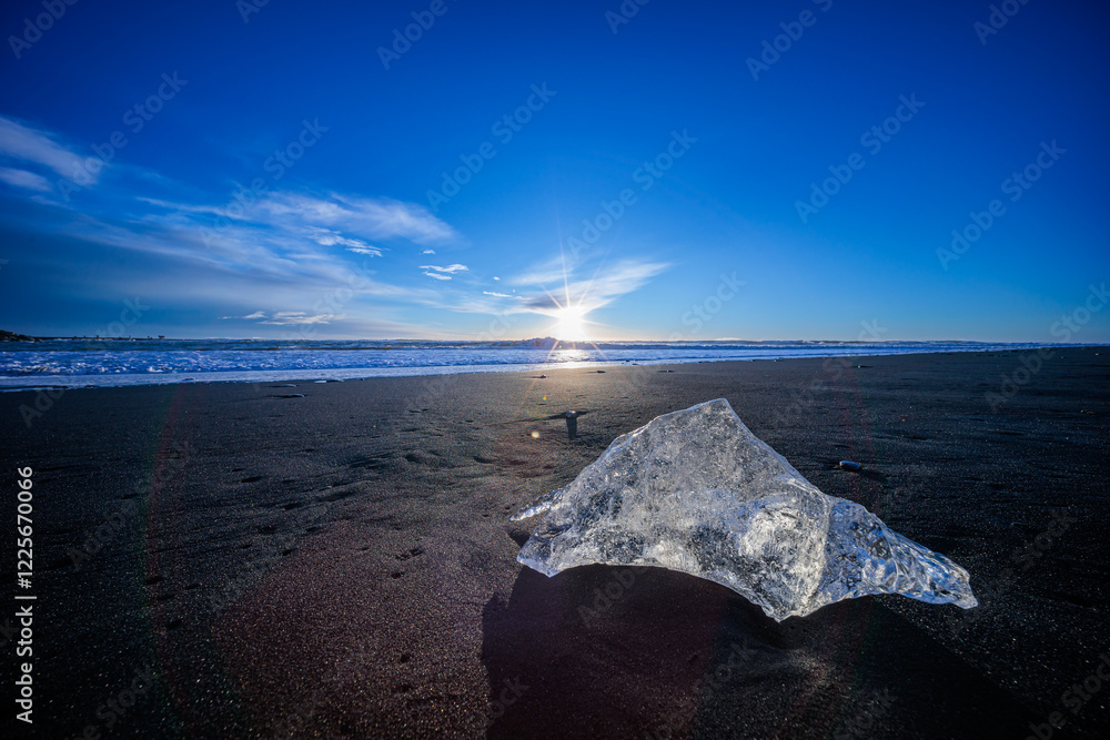 Loose segments of glacier washed out of Jokulsarlon glacial lake onto Diamond Beach on Iceland