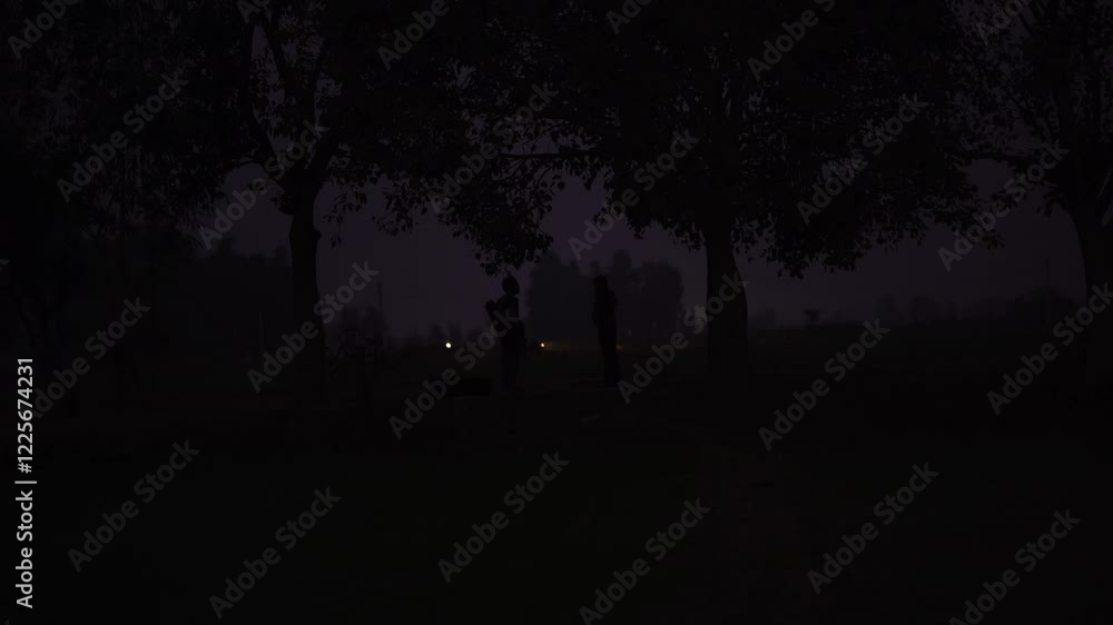 Two peoples talking during evening, silhouette and Moving Vehicles in evening Two peoples talking during evening, silhouette and Moving Vehicles in evening