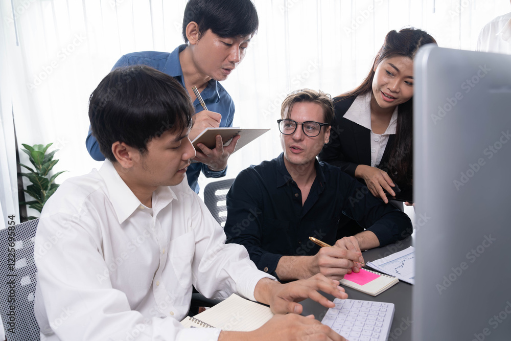Group of diverse office worker employee working together on strategic business marketing planning in corporate office room. Positive teamwork in business workplace concept. Prudent Group of diverse office worker employee working together on strategic business marketing planning in corporate office room. Positive teamwork in business workplace concept. Prudent