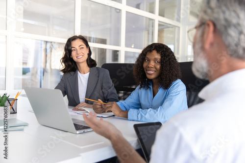 Free Download Bearded businessman in wheelchair leading group of professionals in office - GFXLoad