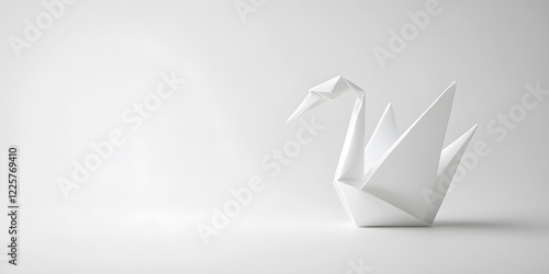 Fototapeta Naklejka Na Ścianę i Meble -  A pristine white origami swan gracefully sits on a minimalist white background.  The intricate folds of the paper bird are highlighted by the soft light, creating a serene and elegant image.
