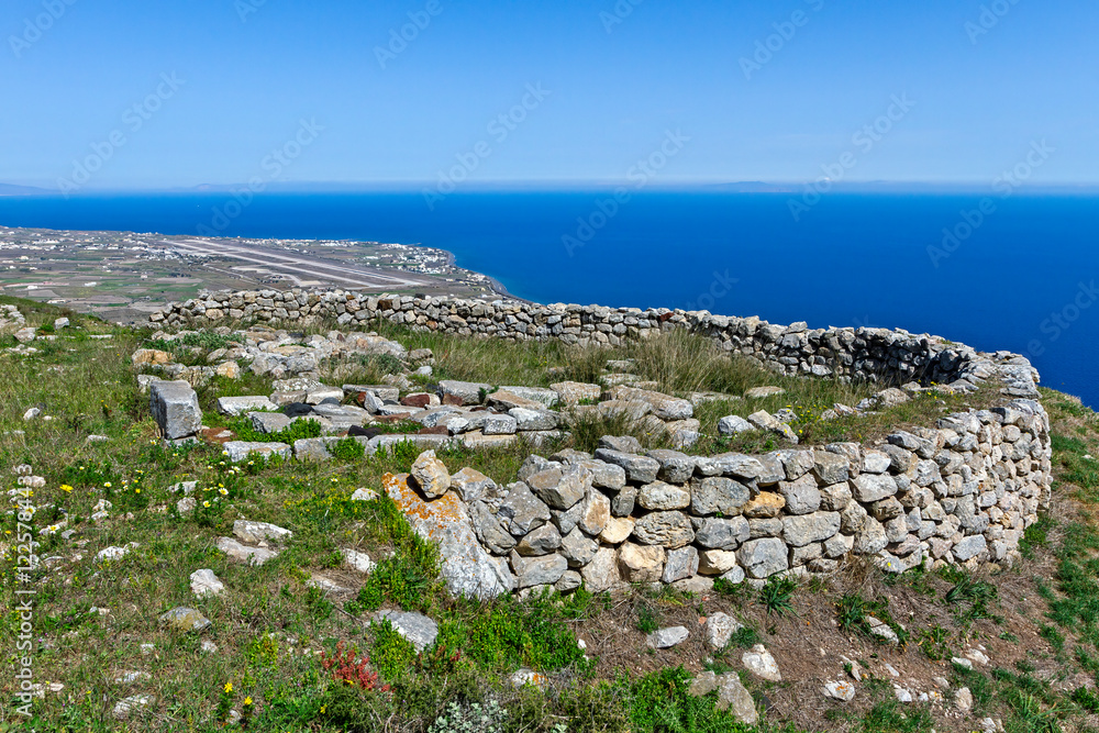 Ruins of Ancient Thera overlooking the Aegean Sea and Kamari, Santorini. A stunning historical site showcasing Greek heritage and breathtaking views.