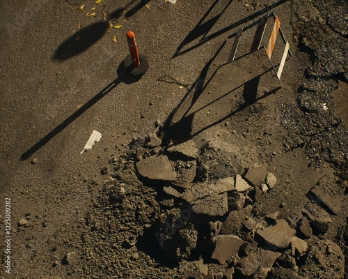 Obraz na płótnie Roadside construction area in sunlight during a sunny day. High angle view. 3D render. w salonie