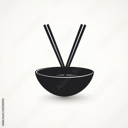 Empty black bowl with chopsticks photo