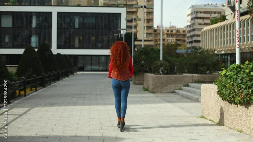 Mixed Race Woman Walking in Urban Landscape in Vibrant Attire Mixed Race Woman Walking in Urban Landscape in Vibrant Attire