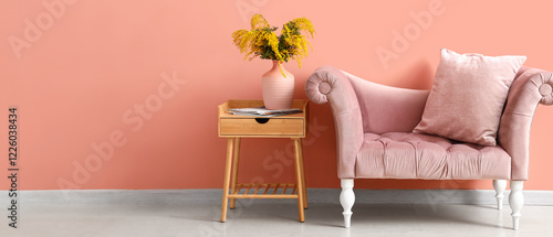 Vase with mimosa flowers on...