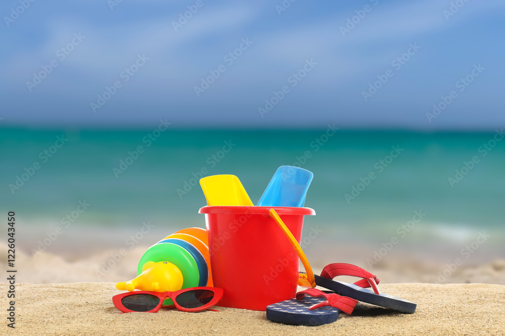 Set of beach toys and accessories for children on sand Set of beach toys and accessories for children on sand