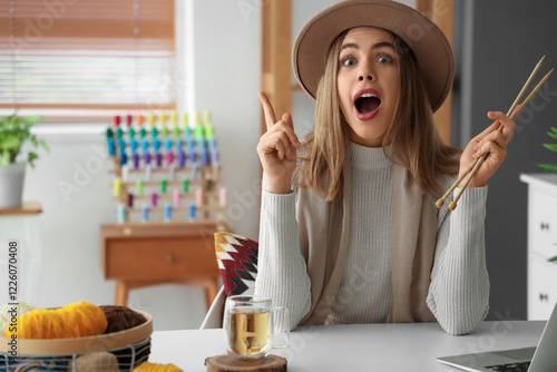 Young woman with knitting n...