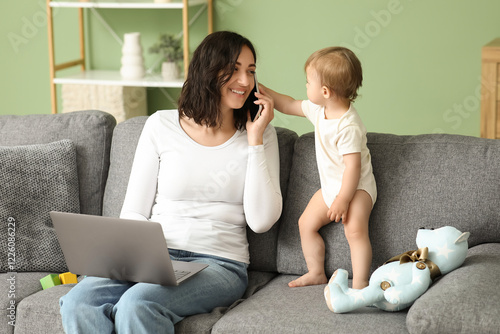 Cute baby and young mother ...