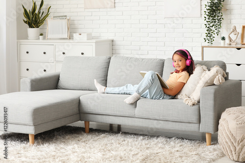 Cute little Asian girl in h...