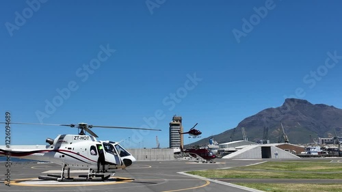 Cape Town South Africa, 07.01.2025, Video. Helicopter activity on the waterfront helipad in Cape Town South Africa. photo