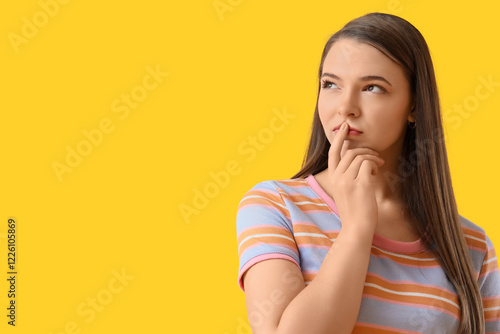 Wondering young woman on ye...