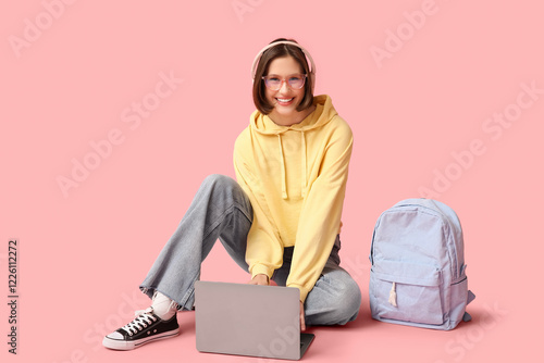 Smiling teen girl student w...