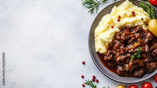 Finnish-style stewed cabbage kaalilaatikko with a portion of mashed potatoes, surrounded by plenty of space for text. photo