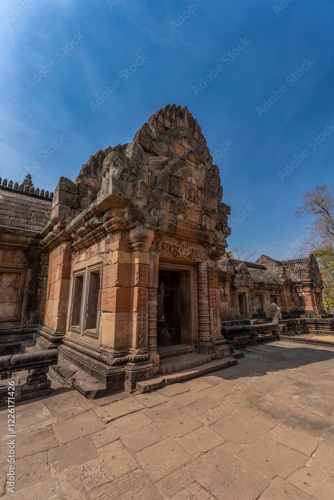 Lintel of the main castle, made of sandstone, carved with images in an ancient site, Ancient architecture Sand Stone Castle in Buriram province, Thailand, Prasat Muang Tam Khmere architectural site. Lintel of the main castle, made of sandstone, carved with images in an ancient site, Ancient architecture Sand Stone Castle in Buriram province, Thailand, Prasat Muang Tam Khmere architectural site.